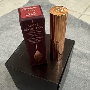 Charlotte Tilbury Matte Revolution Lipstick in Gold and Deep Red